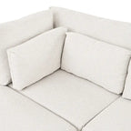 Divano sezionale modulare contemporaneo con pouf mobile e 5 cuscini